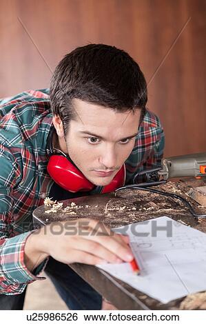 Man looking a plane View Large Photo Image Stock Photograph - Man looking a plane. Fotosearch