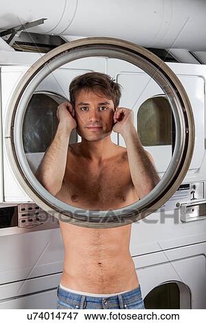 Man looking through the glass View Large Photo Image Stock Photo - Man looking through the glass. Fotosearch