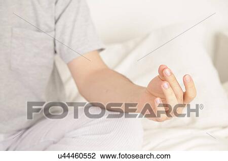 Stock Image - Man meditating. Fotosearch