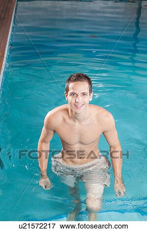 Man out of the pool View Large Photo Image Stock Photo - Man out of the pool. Fotosearch
