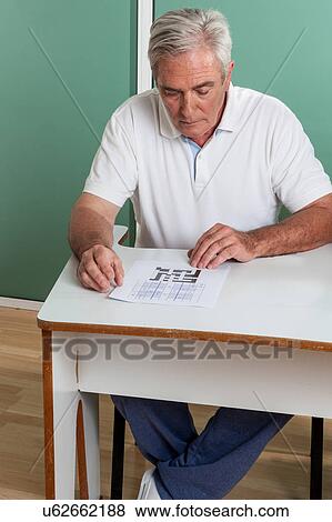 Man playing a games View Large Photo Image Stock Photo - Man playing a games. Fotosearch