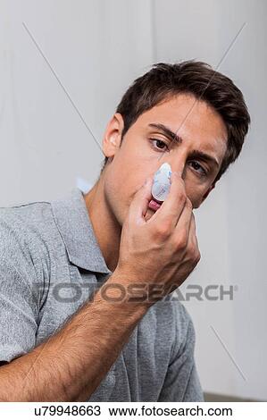 Man putting eye drops View Large Photo Image Stock Image - Man putting eye drops. Fotosearch