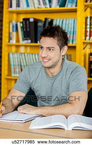Stock Photography - Man reading a book. Fotosearch