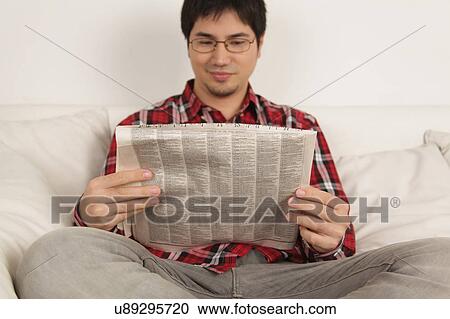 Man reading the newspaper View Large Photo Image Stock Image - Man reading the newspaper. Fotosearch