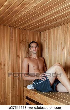 Man resting inside the sauna View Large Photo Image Stock Photo - Man resting inside the sauna. Fotosearch