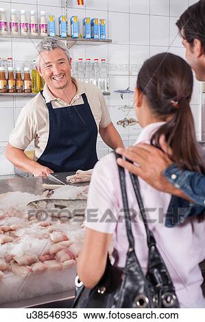 Man selling a Silverside View Large Photo Image Stock Photography - Man selling a Silverside . Fotosearch
