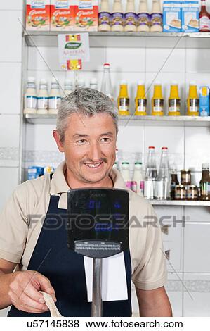 Man selling fish View Large Photo Image Stock Photo - Man selling fish. Fotosearch