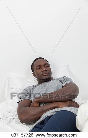 Man sleeping View Large Photo Image Stock Photograph - Man sleeping. Fotosearch