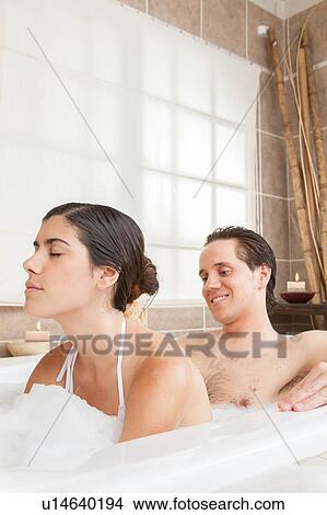 Man soaping his wife View Large Photo Image Picture - Man soaping his wife. Fotosearch