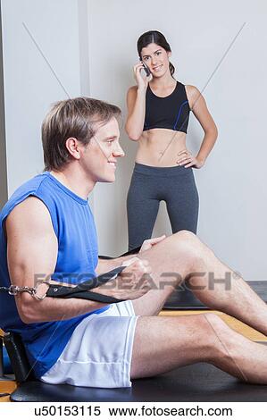 Man training in the gym View Large Photo Image Stock Photography - Man training in the gym. Fotosearch