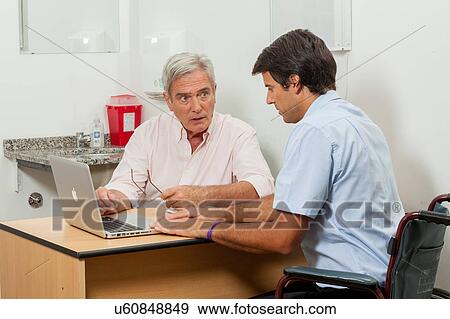 Man visiting the doctor View Large Photo Image Stock Photo - Man visiting the doctor. Fotosearch