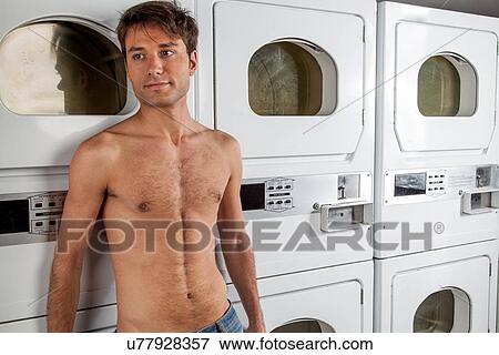 Man waiting for clothes View Large Photo Image Stock Photo - Man waiting for clothes. Fotosearch