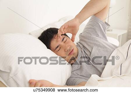 Man waking up View Large Photo Image Stock Photo - Man waking up. Fotosearch