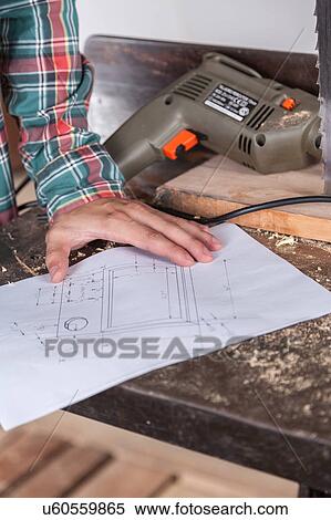 Stock Photography - Man with a plane. Fotosearch
