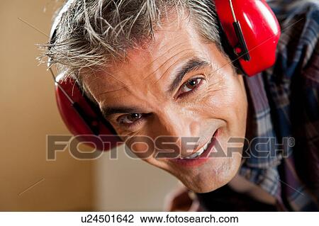 Stock Image - Man with headphones. Fotosearch