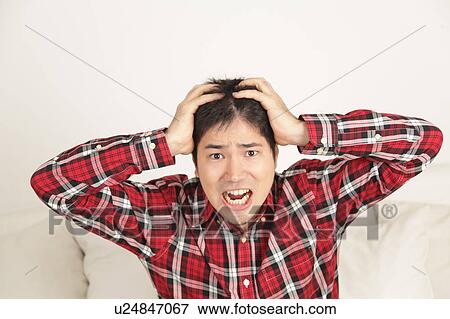 Stock Photo - Man worried and shouting. Fotosearch