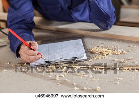 Man writing View Large Photo Image Stock Photo - Man writing . Fotosearch