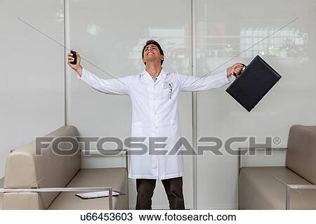 ophthalmologist celebrating View Large Photo Image Stock Image - ophthalmologist celebrating. Fotosearch