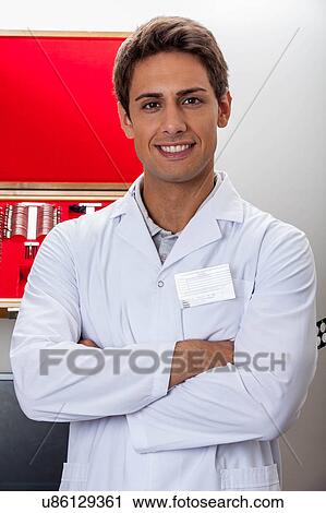 Ophthalmologist looking at camera View Large Photo Image Stock Image - Ophthalmologist looking at camera. Fotosearch