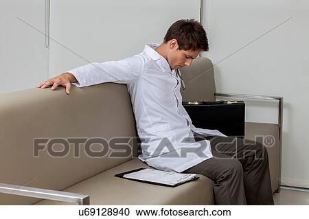 Ophthalmologist resting View Large Photo Image Stock Image - Ophthalmologist resting. Fotosearch