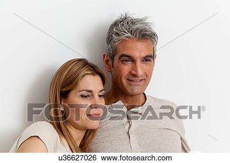 Portrait of a happy couple View Large Photo Image Stock Photograph - Portrait of a happy couple. Fotosearch