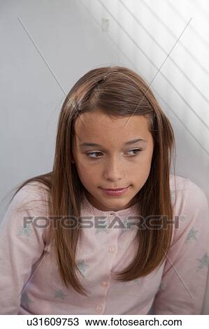 Stock Image - Portrait of a pretty girl. Fotosearch