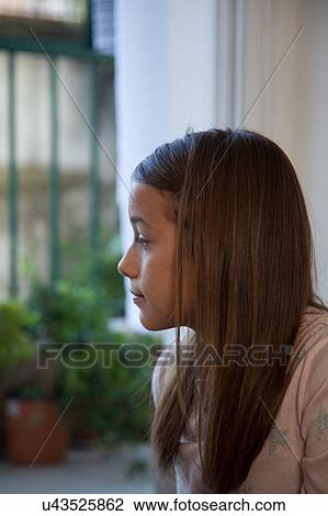 Stock Image - Portrait of a pretty girl. Fotosearch
