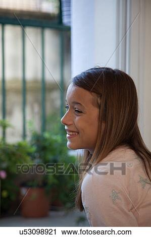 Stock Image - Portrait of a pretty girl. Fotosearch