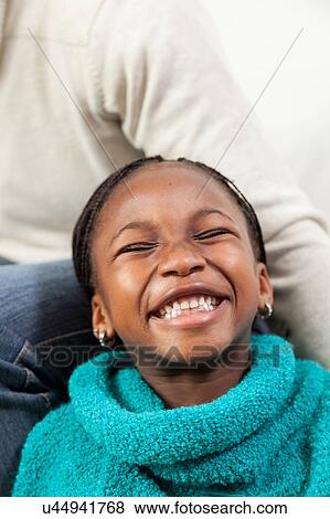 Stock Photo - Portrait of black girl smiling. Fotosearch