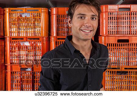 Portrait of man in the laundry View Large Photo Image Stock Photography - Portrait of man in the laundry. Fotosearch
