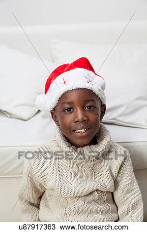 Portrait of man with Christmas hat View Large Photo Image Stock Image - Portrait of man with Christmas hat. Fotosearch