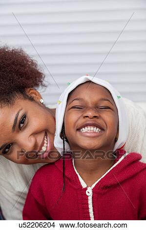 Portrait of mother and daughter smiling View Large Photo Image Picture - Portrait of mother and daughter smiling. Fotosearch