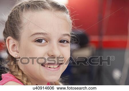 Pretty girl smiling View Large Photo Image Stock Photograph - Pretty girl smiling. Fotosearch