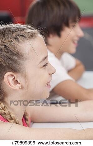 Pretty girl smiling View Large Photo Image Stock Photograph - Pretty girl smiling. Fotosearch