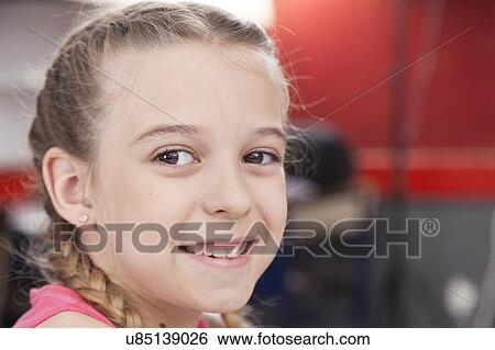 Stock Photograph - Pretty girl smiling. Fotosearch
