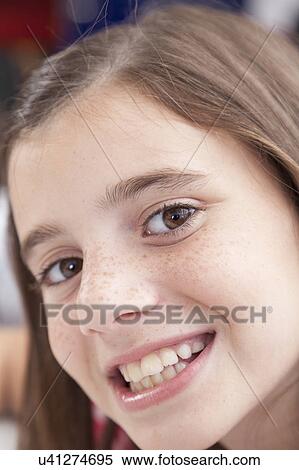 Pretty girl smiling View Large Photo Image Stock Photography - Pretty girl smiling. Fotosearch