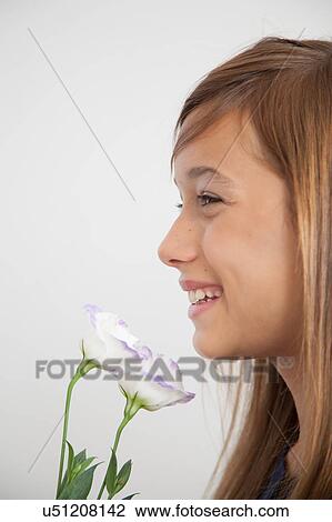 Pretty girl with flowers View Large Photo Image Stock Image - Pretty girl with flowers. Fotosearch