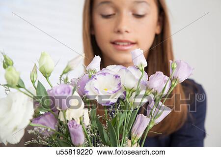 Pretty girl with flowers View Large Photo Image Stock Image - Pretty girl with flowers. Fotosearch