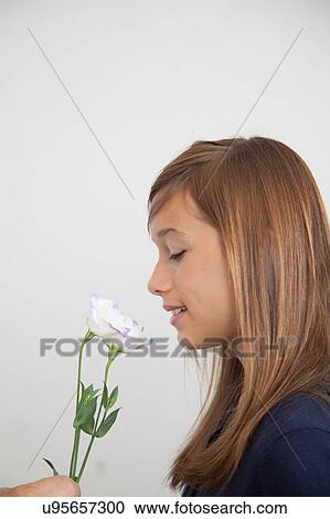 Pretty girl with flowers View Large Photo Image Stock Image - Pretty girl with flowers. Fotosearch
