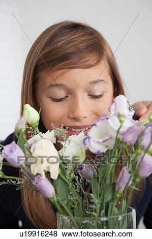 Pretty girl with flowers View Large Photo Image Stock Photo - Pretty girl with flowers. Fotosearch