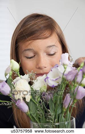Pretty girl with flowers View Large Photo Image Stock Photo - Pretty girl with flowers. Fotosearch