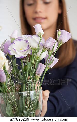 Pretty girl with flowers View Large Photo Image Stock Photo - Pretty girl with flowers. Fotosearch
