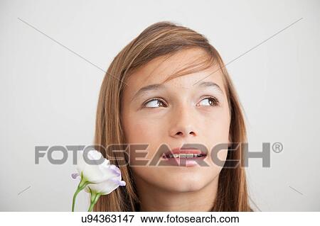 Pretty girl with flowers View Large Photo Image Stock Photo - Pretty girl with flowers. Fotosearch