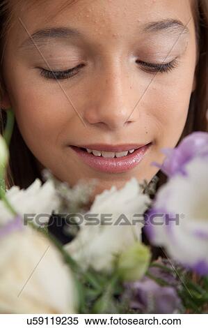 Pretty girl with flowers View Large Photo Image Stock Photography - Pretty girl with flowers. Fotosearch