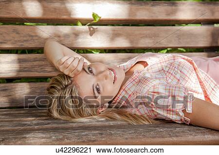 Stock Image - Pretty woman relaxed. Fotosearch