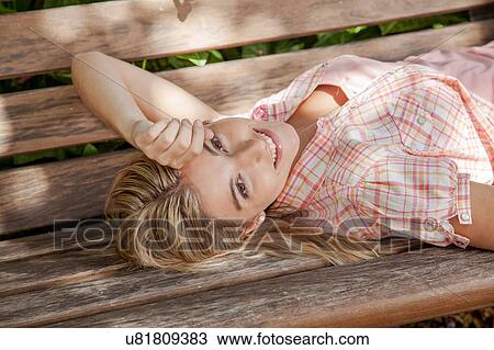 Stock Image - Pretty woman relaxed. Fotosearch