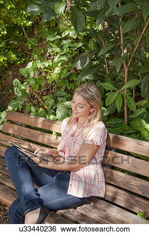 Pretty woman relaxed View Large Photo Image Stock Photograph - Pretty woman relaxed. Fotosearch