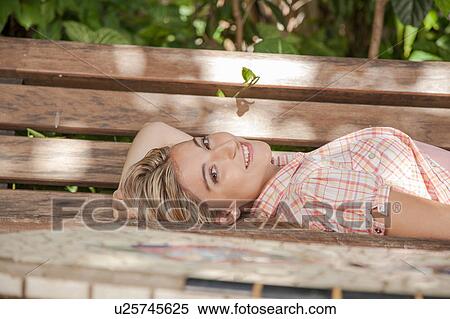 Stock Photography - Pretty woman relaxed. Fotosearch