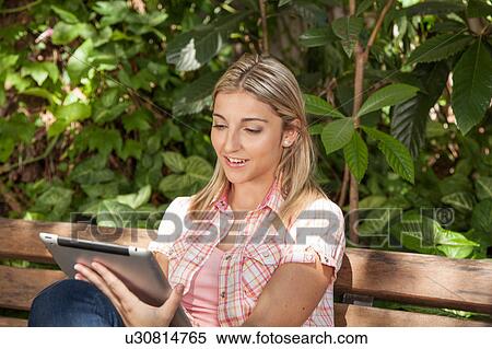 Stock Photography - Pretty woman relaxed. Fotosearch