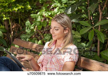 Pretty woman relaxed View Large Photo Image Stock Photography - Pretty woman relaxed. Fotosearch